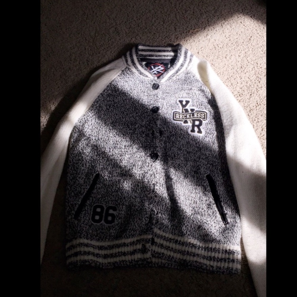 YOUNG AND RECKLESS SWEATER